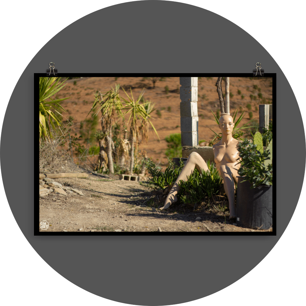 un4rt - almost human gallery poster mockup picture with a mannequin sitting outdoor in between some plants