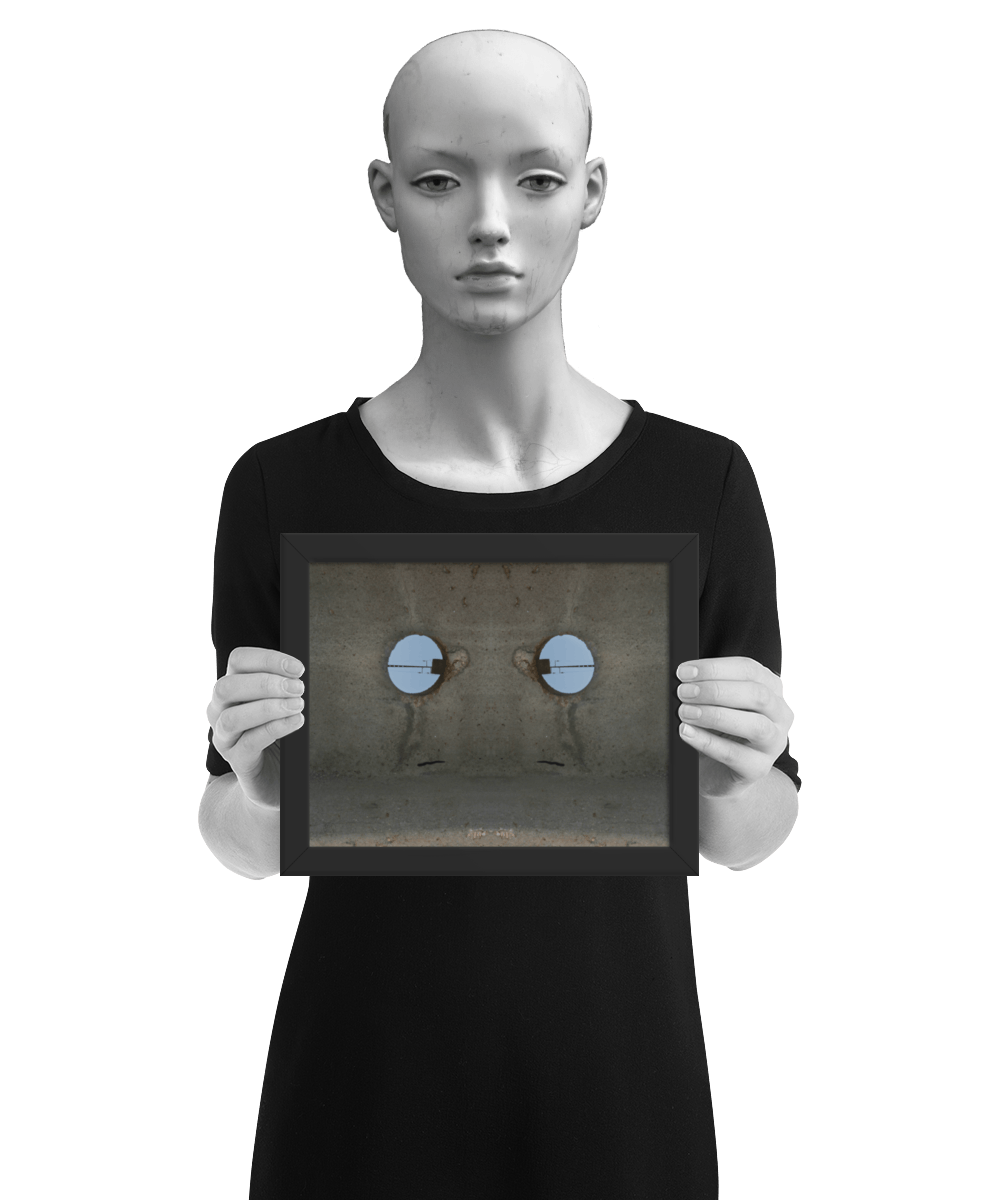 un4rt - the photographie shows a section of an concrete pole with a holes. the whole image contains the photographie for 2 times and one of the photographies is mirrored. the image is framed and presented by a model in black and white.