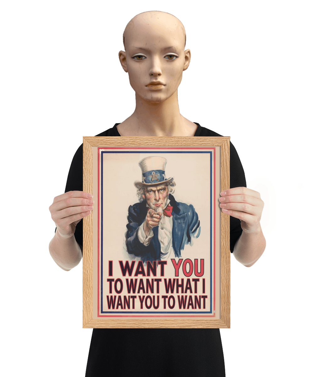 un4rt - the image shows a mannequin holding a framed poster with an edited picture of a famous "uncle sam" painting where he is pointing at the viewer with his index finger. the picture is framed with red and blue lines. the text below the picture reads: "I want you to want what  want you to want".