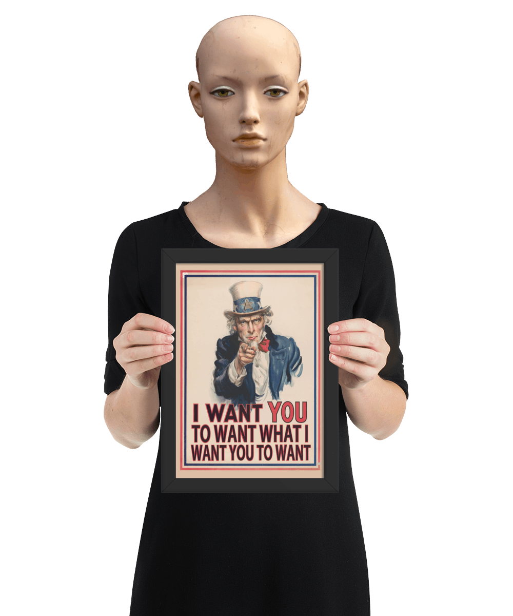 un4rt - the image shows a mannequin holding a framed poster with an edited picture of a famous "uncle sam" painting where he is pointing at the viewer with his index finger. the picture is framed with red and blue lines. the text below the picture reads: "I want you to want what  want you to want".