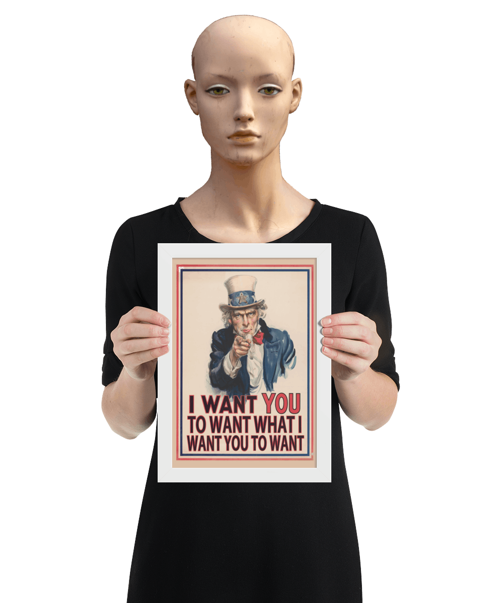 un4rt - the image shows a mannequin holding a framed poster with an edited picture of a famous "uncle sam" painting where he is pointing at the viewer with his index finger. the picture is framed with red and blue lines. the text below the picture reads: "I want you to want what  want you to want".