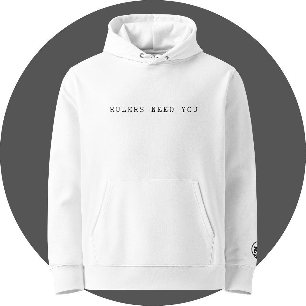 un4rt - the image shows the front of a white cotton hoodie with printed black letters on the upper area. the text reads: "rulers need you". a black "UN4RT"-logo embroidery on the left sleeve, but only the upper part of the logo is visible.