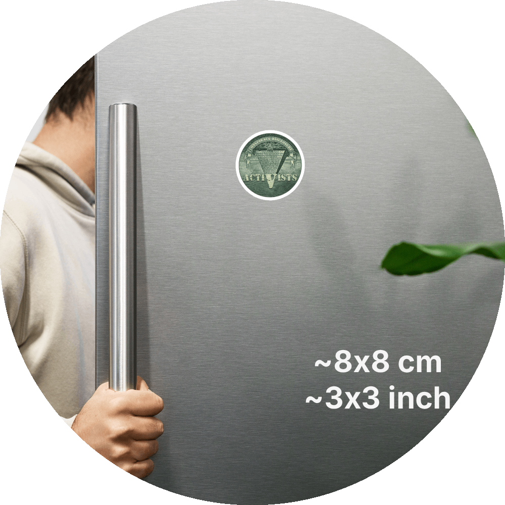 un4rt - the image shows a part of a fridge-door that is opened.the fridge-door has a round magnet on it. the picture on the magnet shows an edited part of a section of a 1 dollar note with an inverted pyramid. the all-seeing eye is at the top, on the wide part of the pyramid. the banderole reads "conspiracy-disclosure" and the pointed part of the pyramid reads "activists". measurements of the magnet in cm and inch are written on the right sight of the image.