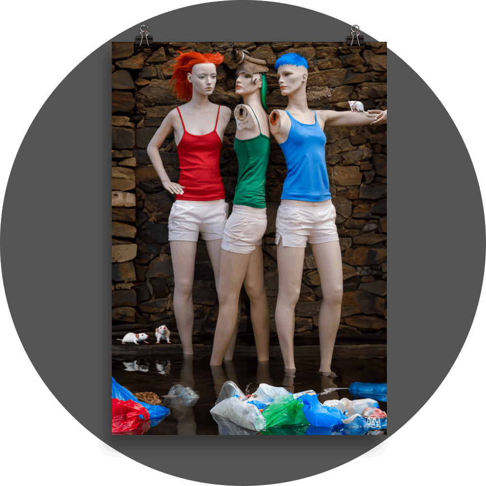 un4rt - combination of photographie and ai-art. three mannequins in front of an old stone wall. all three are wearing white short pants. one mannequin has red hair and wears a red top. one  annequin has green hair and wears a green top. one mannequin has blue hair and wears a blue top. the three mannequins are standing in dirty water. some trash in the water and white mice around them.