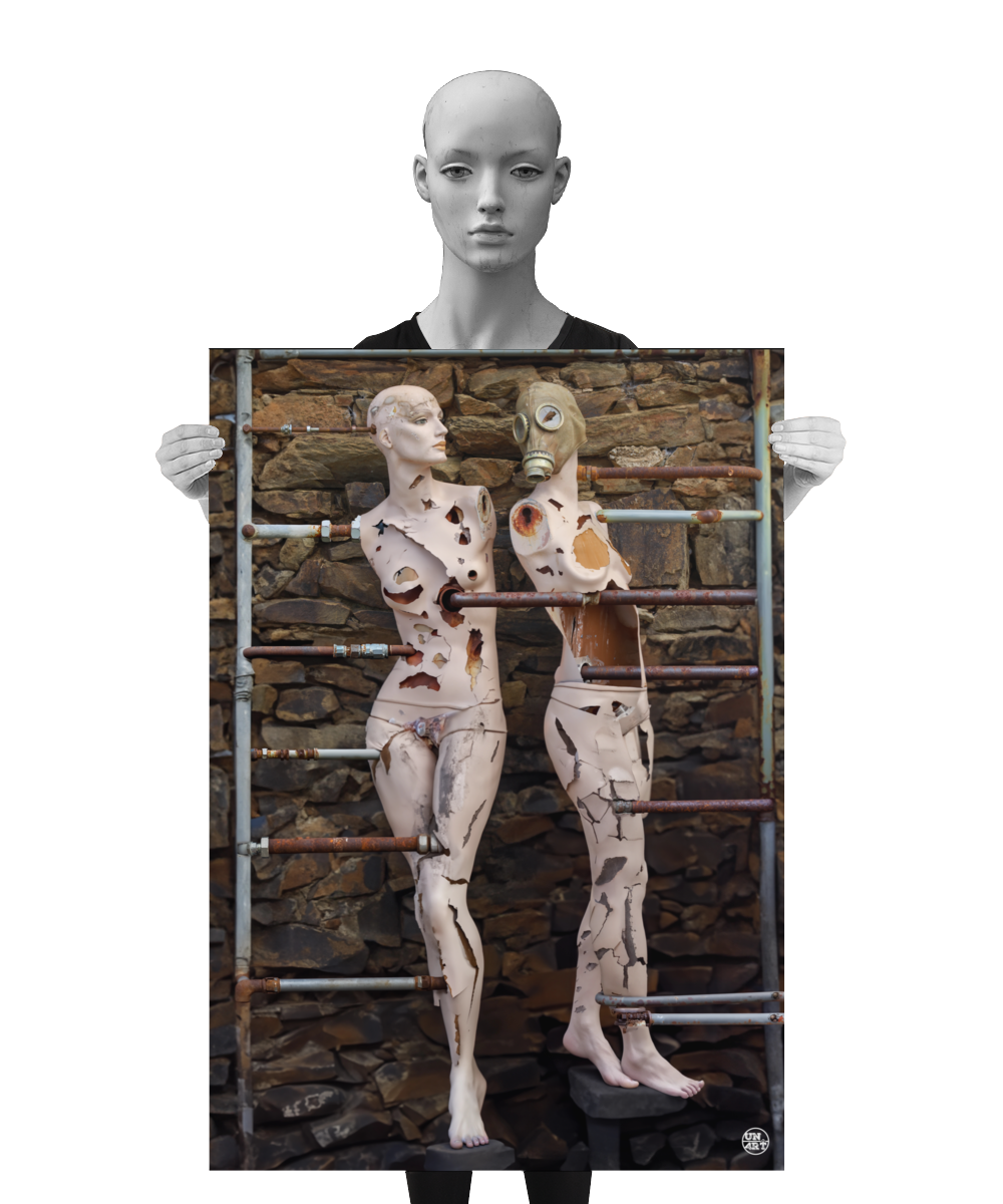 un4rt - a poster. combination of photographie and ai-art. two mannequins with massive signs of destruction in front of an old stone wall. both mannequins are connected with various rusty pipes. one of them is wearing a gas mask. a mannequin is holding the poster.