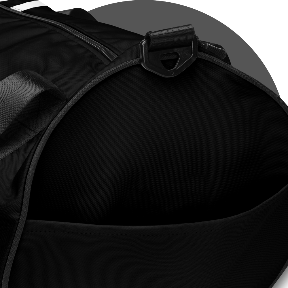 un4rt - the image shows details of one side of a black tubular gym bag. the side has a pocket.