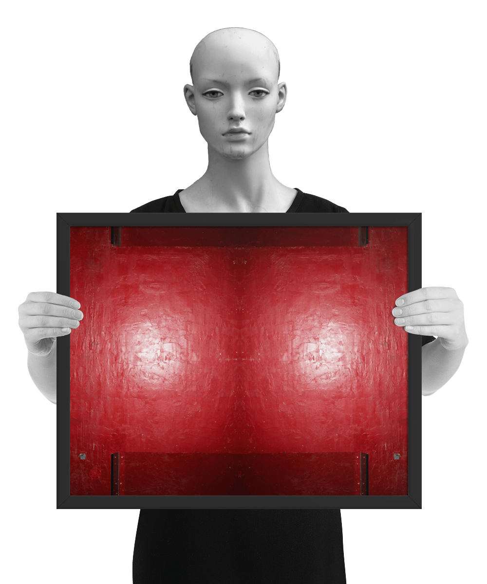un4rt - the photographie is doubled and then mirrored to create the final image. the image shows a structured red wall with some signs of destruction and a bright reflection of a light in the center. darker parts on the top and the bottom. the image is framed and presented by a mannequin in black and white.