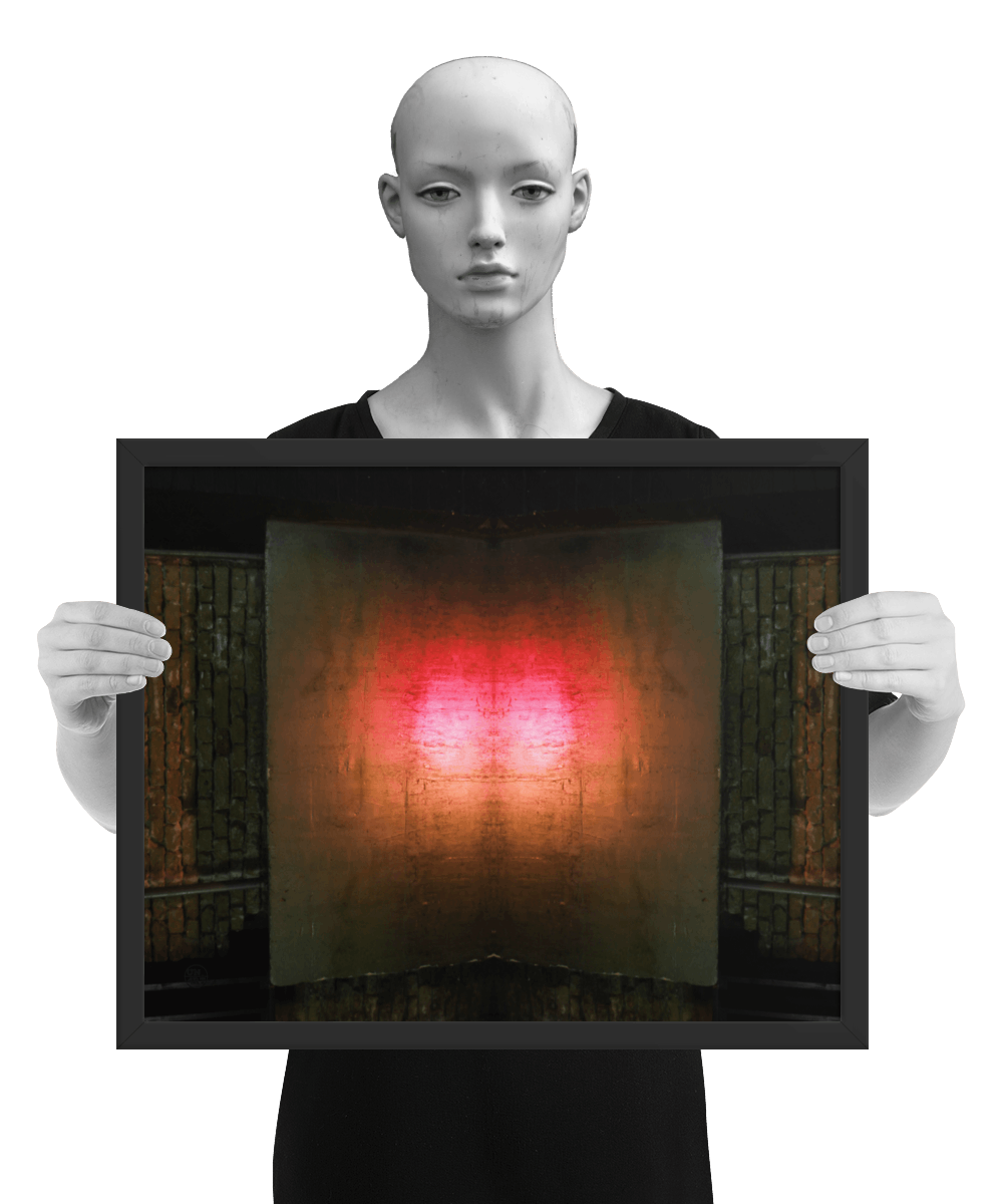 un4rt - the photographie is doubled and then mirrored to create the final image. the photographie shows a brick wall with a porch made of concrete. a steel pipe is coming out of the porch. the colors are mainly golden, but the center of the porch is reflecting light in the colors of orange, red and white. the image is framed and presented by a mannequin in black and white.
