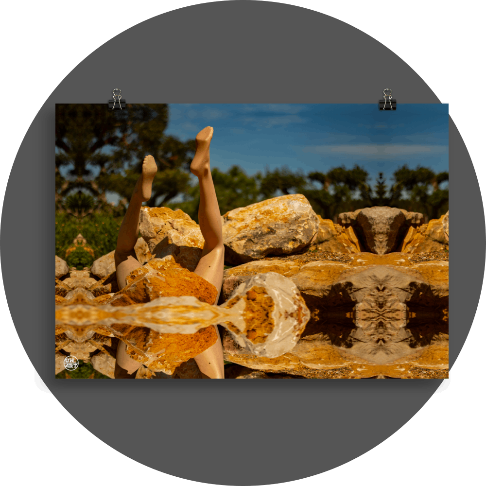 un4rt - a photographie that is mirrored on all sides. the image shows the legs of a mannequin which seems to be stuck upside down in a mountain of stones. some old olive trees and a blue sky with a few white clouds in the background. the background is unfocused.