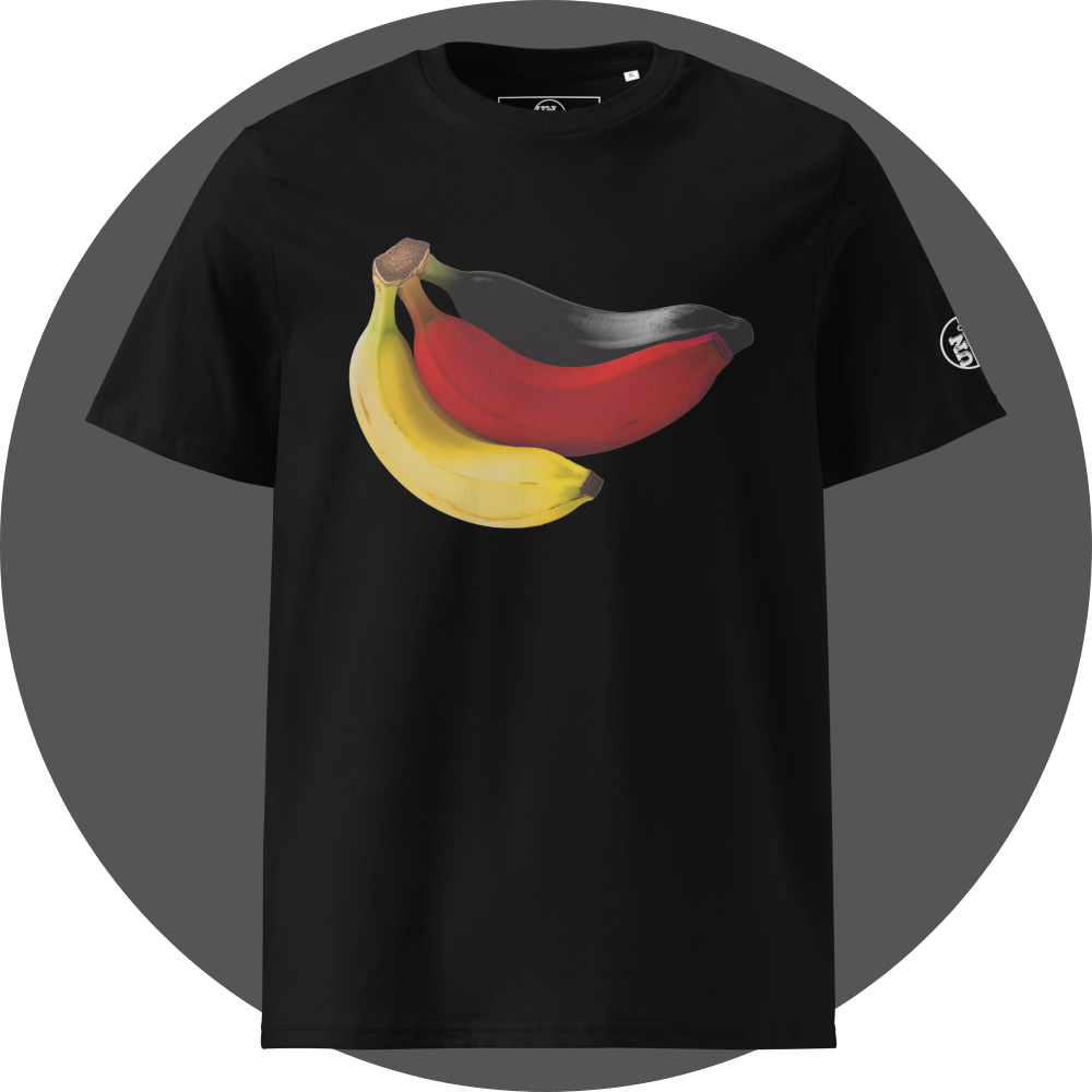 UN4RT black organic cotton t-shirt shown from the front, featuring a large colorful banana artwork with three bananas in yellow, red and black, symbolizing the german flag. small circular brand logo on the left sleeve.