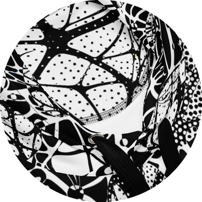 UN4RT brainbubbles hoodie hood detail – circular close-up of drawstring hood showing dense black organic network pattern with stippled dot cluster segments, star-shaped node intersections and fine curved line forms on white fabric, silver metal eyelet and black drawstring visible at centre.