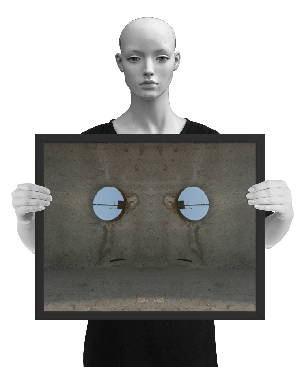 un4rt - the photographie shows a section of an concrete pole with a holes. the whole image contains the photographie for 2 times and one of the photographies is mirrored. the image is framed and presented by a model in black and white.