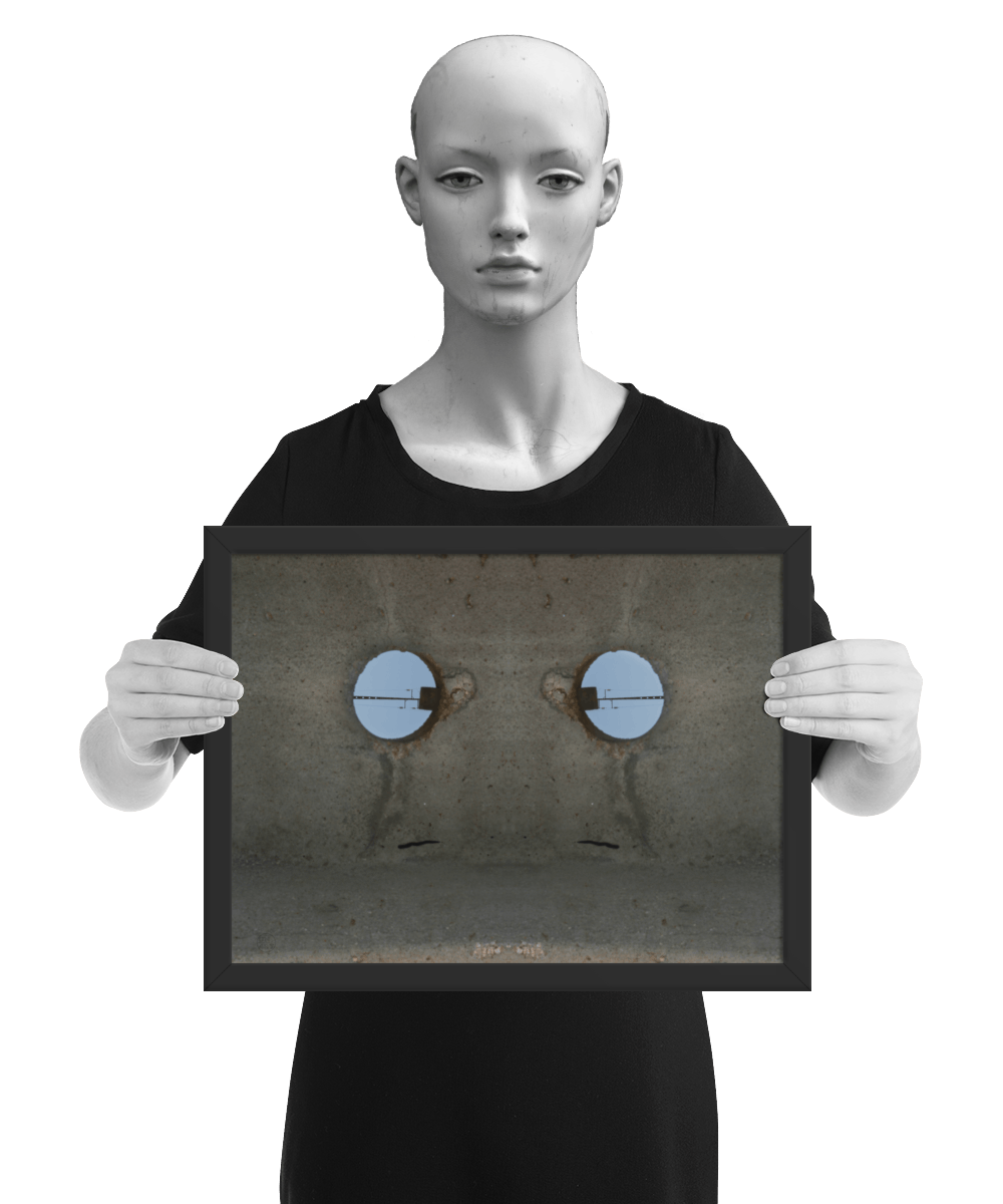un4rt - the photographie shows a section of an concrete pole with a holes. the whole image contains the photographie for 2 times and one of the photographies is mirrored. the image is framed and presented by a model in black and white.