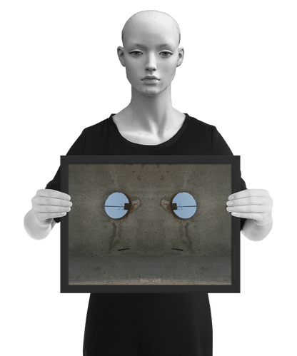 un4rt - the photographie shows a section of an concrete pole with a holes. the whole image contains the photographie for 2 times and one of the photographies is mirrored. the image is framed and presented by a model in black and white.