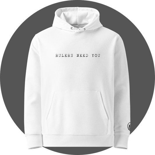 un4rt - the image shows the front of a white cotton hoodie with printed black letters on the upper area. the text reads: "rulers need you". a black "UN4RT"-logo embroidery on the left sleeve, but only the upper part of the logo is visible.