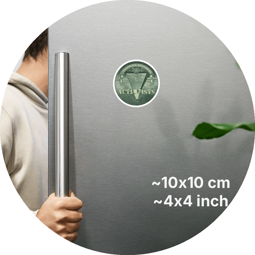 un4rt - the image shows a part of a fridge-door that is opened.the fridge-door has a round magnet on it. the picture on the magnet shows an edited part of a section of a 1 dollar note with an inverted pyramid. the all-seeing eye is at the top, on the wide part of the pyramid. the banderole reads "conspiracy-disclosure" and the pointed part of the pyramid reads "activists". measurements of the magnet in cm and inch are written on the right sight of the image.