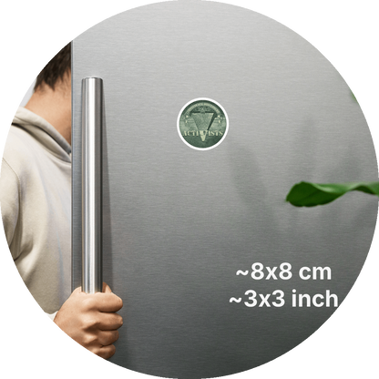 un4rt - the image shows a part of a fridge-door that is opened.the fridge-door has a round magnet on it. the picture on the magnet shows an edited part of a section of a 1 dollar note with an inverted pyramid. the all-seeing eye is at the top, on the wide part of the pyramid. the banderole reads "conspiracy-disclosure" and the pointed part of the pyramid reads "activists". measurements of the magnet in cm and inch are written on the right sight of the image.