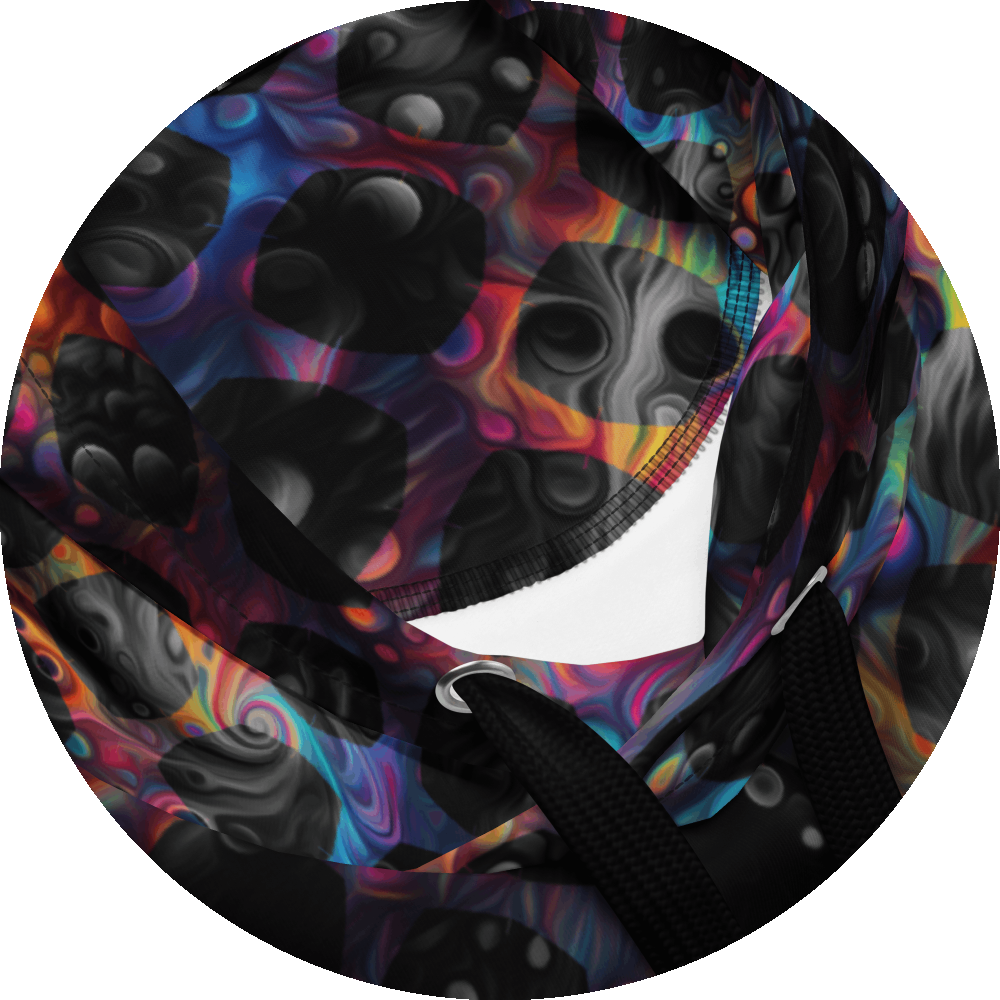un4rt - the image shows details of a hoodie with images with bubbles and cosmic enery lines in the background. the background is overlayed by a grid pattern with rounded squares. the background images are colorfull (rainbow colors). the background shines through the whole grid, but inside the rounded squares of the grid the backround is black and white. 