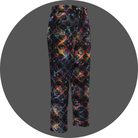 UN4RT cosmic grid all-over-print jogging pants front right view – dark sweatpants with three-dimensional black sphere and bubble cluster pattern, iridescent neon rainbow glow in pink, blue, orange and teal between forms, elasticated drawstring waistband, straight leg cut.