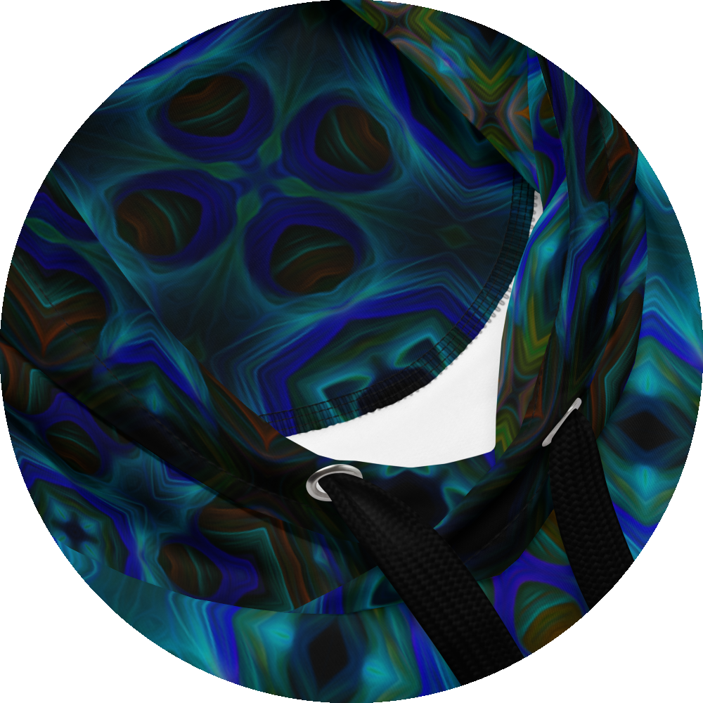 un4rt - the image shows details of a hoodie with a repeating pattern in bright and dark blue, dark orange and dirty green tones. the pattern includes star-shaped and rectangular elements. large square elements with broad contours overlay the pattern. the colors of the pattern are darkened within the contours of the squares. 