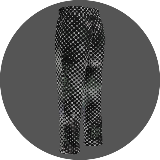 UN4RT doterium all-over-print jogging pants back left view – white sweatpants with halftone dot pattern of solid black circles fading into hollow rings, small UN4RT logo visible at lower leg, elasticated waistband, straight leg cut.