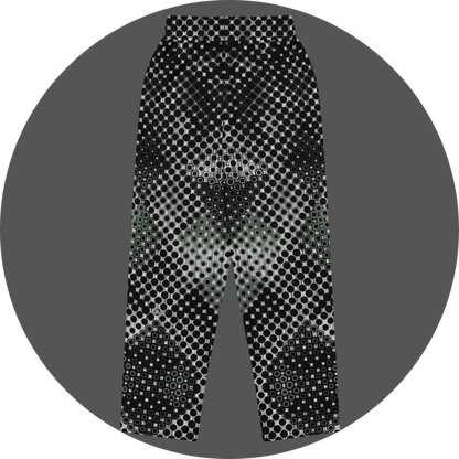 UN4RT doterium all-over-print jogging pants back flat – white sweatpants with symmetrical halftone dot pattern of solid black circles fading into hollow rings, small UN4RT logo at lower leg, elasticated waistband.