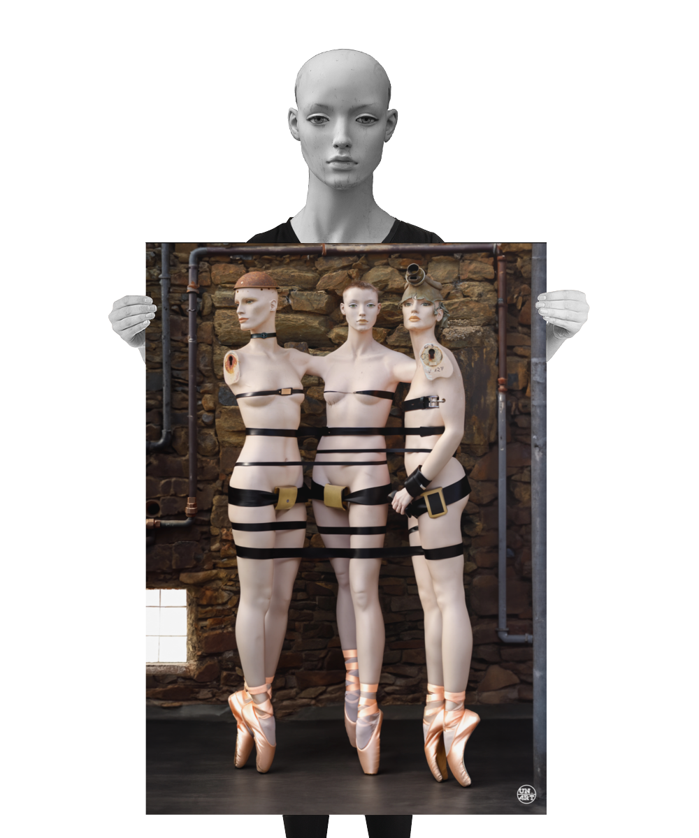 un4rt - a poster. combination of photographie and ai-art. three mannequins in front of an old stone wall. all three are are tied together with black leather belts and all three are wearing ballett shoes. they stand on their toes. one mannequin is wearing a gas mask, one is wearing a rusty hat. their arms are merged. a mannequin is holding the poster.