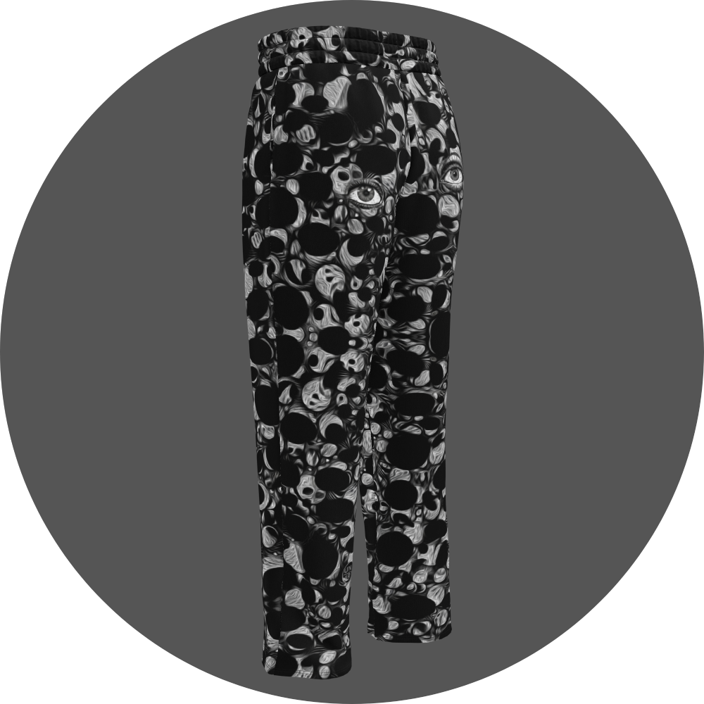UN4RT eyesolation all-over-print jogging pants back left view – black sweatpants with dense abstract pattern of black organic blob shapes and grey brushstroke texture, subtle eye motif visible in print, elasticated waistband, straight leg cut.