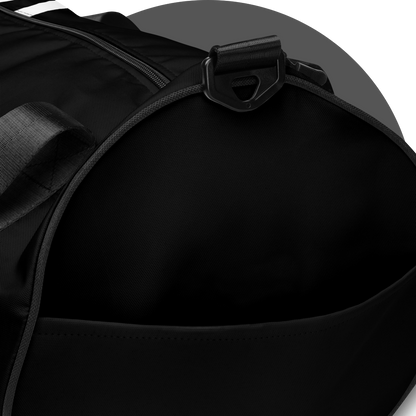 un4rt - the image shows details of one side of a black tubular gym bag. the side has a pocket. 