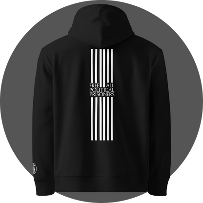 un4rt - the image shows the back of a black cotton hoodie with a print of six vertical white stripes in the middle of the upper area. the stripes are interrupted with text. the text reads:"free all political prisoners". a white "UN4RT"-logo embroidery on the left sleeve.