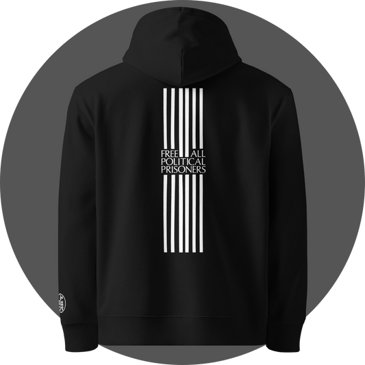 un4rt - the image shows the back of a black cotton hoodie with a print of six vertical white stripes in the middle of the upper area. the stripes are interrupted with text. the text reads:"free all political prisoners". a white "UN4RT"-logo embroidery on the left sleeve.