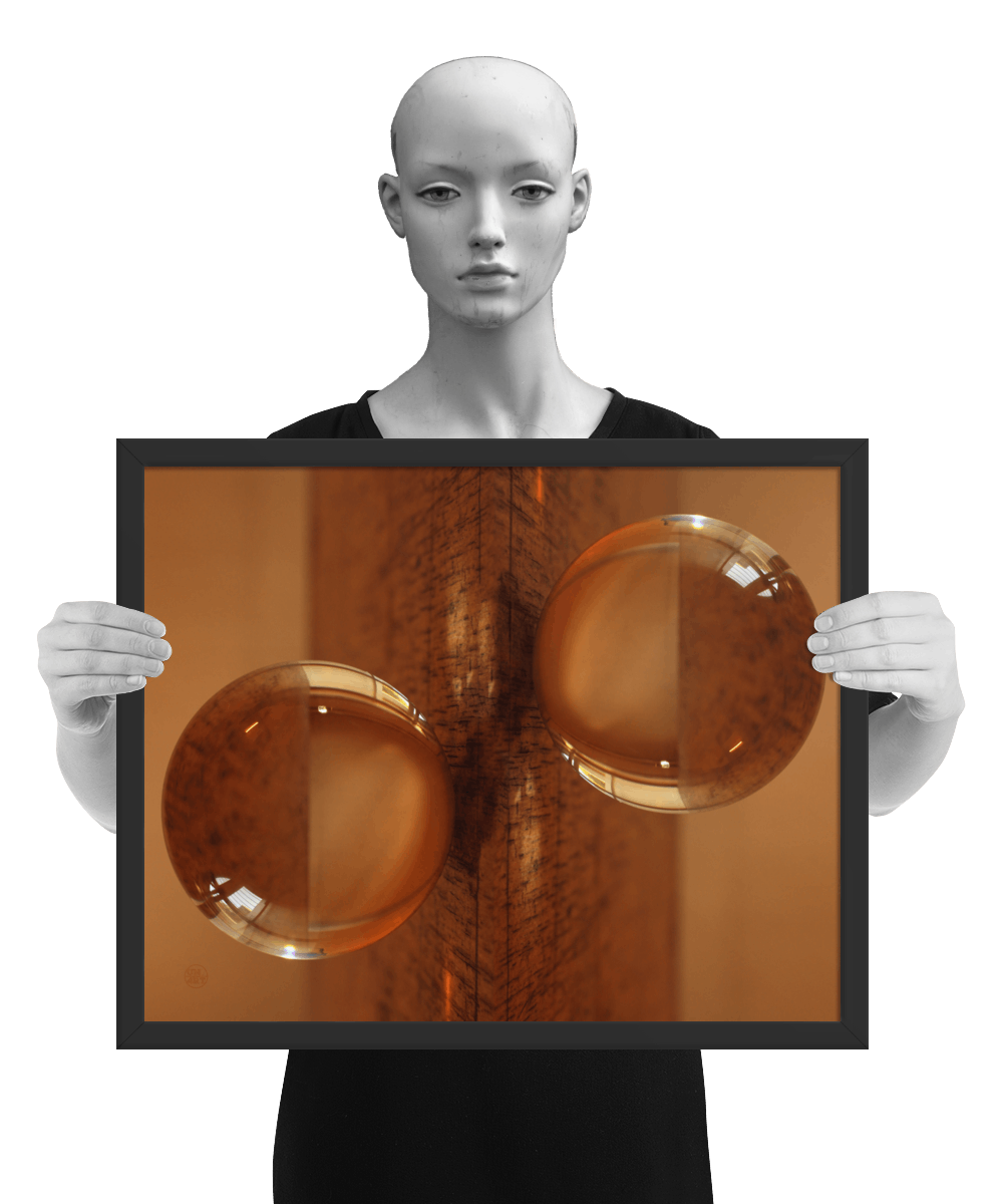 un4rt - the photographie is doubled and then mirrored. both photographies together create the final image. the photographie shows a glass ball on a wooden board. the wooden board is reflecting inside the glasball. the colors range from light brown to orange. the image is framed and presented by a mannequin in black and white.