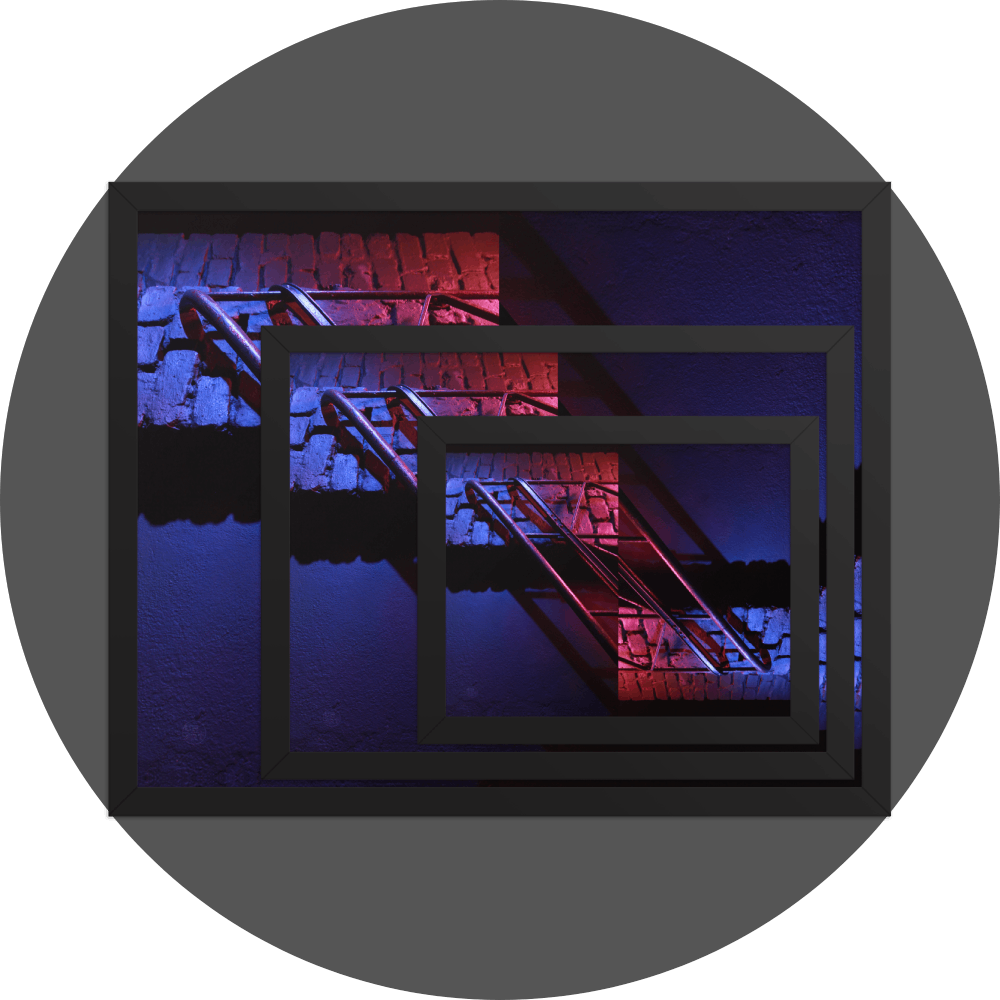 un4rt - the image shows 3 different sizes of the same photographie on top of each other. large size in the back, medium size in the middle and small size on top. the photographie is doubled and then mirrored. both photographies together create the final image. the image shows a brick wall and a wall with a handrail. the illumination changes from red to blue.