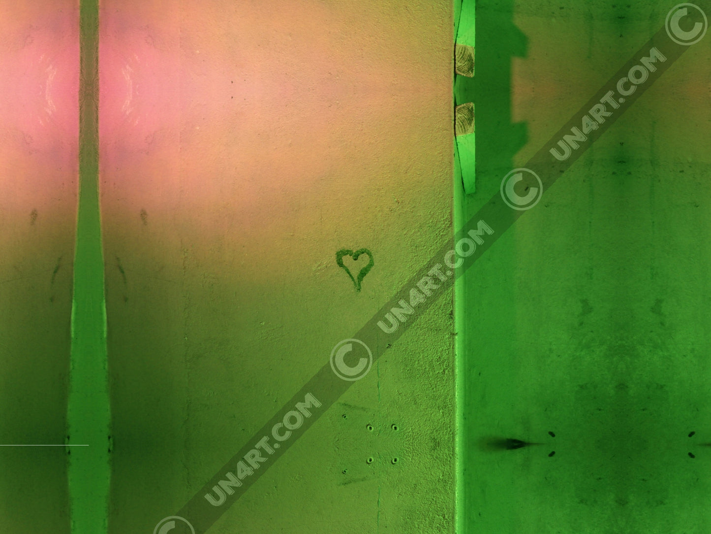 un4rt - the photographie shows a wall that is colored in green, ochre and pink. the symbol of a heart is painted on the wall.
