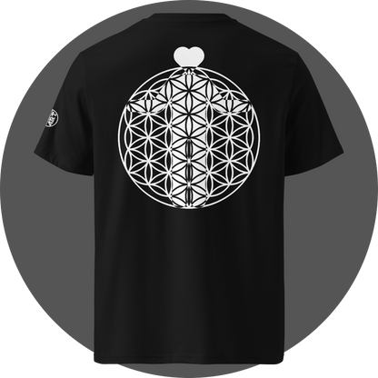 UN4RT black organic cotton t-shirt shown from the back, featuring a large white flower of life sacred geometry pattern printed as a circle. in the upper area a white heart shape positioned above it, small circular brand logo visible on the left sleeve.