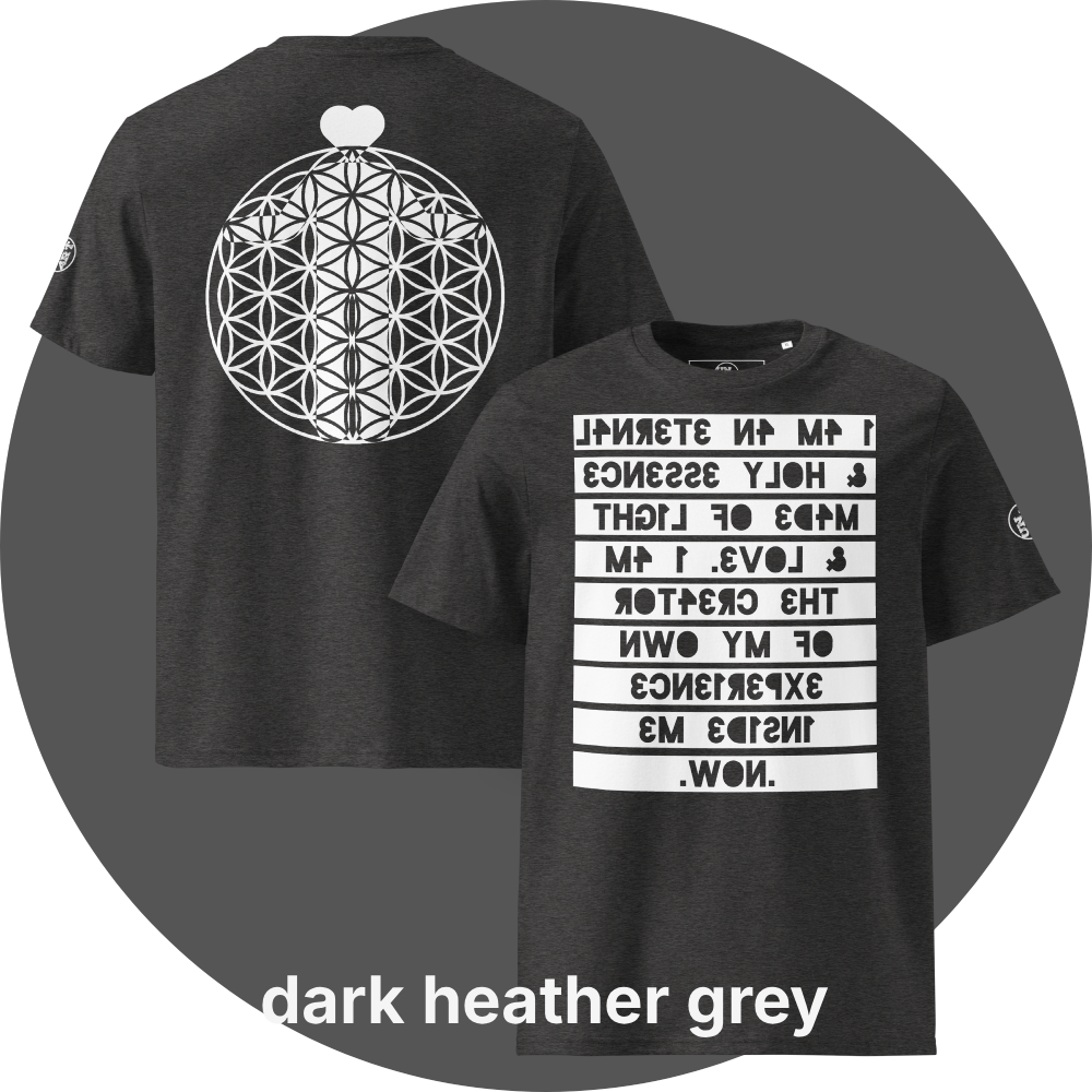 UN4RT dark heather grey organic cotton t-shirt shown from the front and back, front features a large mirrored text artwork on a white rectangular background with reversed dark grey bold lettering reading "i am an eternal & holy essence, made of light & love. i am the creator of my own experience inside me. now.", back features a large white flower of life sacred geometry circle with a white heart shape above it, small circular brand logo visible on both left sleeves.
