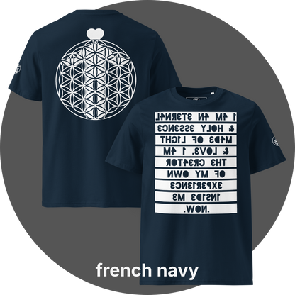 UN4RT french navy organic cotton t-shirt shown from the front and back, front features a large mirrored text artwork on a white rectangular background with reversed navy blue bold lettering reading "i am an eternal & holy essence, made of light & love. i am the creator of my own experience inside me. now.", back features a large white flower of life sacred geometry circle with a white heart shape above it, small circular brand logo visible on both left sleeves.