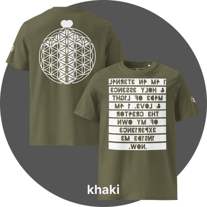 UN4RT khaki organic cotton t-shirt shown from the front and back, front features a large mirrored text artwork on a white rectangular background with reversed dark olive bold lettering reading "i am an eternal & holy essence, made of light & love. i am the creator of my own experience inside me. now.", back features a large white flower of life sacred geometry circle with a white heart shape above it, small circular brand logo visible on both left sleeves.