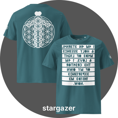 UN4RT teal organic cotton t-shirt shown from the front and back, front features a large mirrored text artwork on a white rectangular background with reversed teal bold lettering reading "i am an eternal & holy essence, made of light & love. i am the creator of my own experience inside me. now.", back features a large white flower of life sacred geometry circle with a white heart shape above it, small circular brand logo visible on the left sleeve.