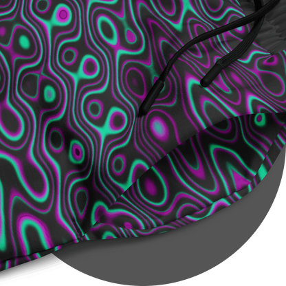 UN4RT liquification jogging pants fabric detail – close-up of all-over-print showing flowing neon turquoise and magenta liquid curves on black fabric, black drawstring visible at waistband, fine print quality showcased.