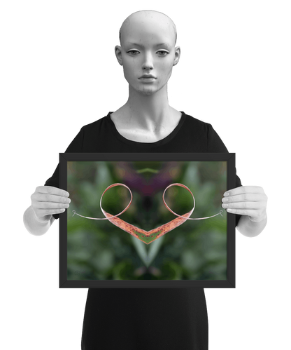 un4rt - the photographie is doubled and then mirrored to create the final image. the image shows a dried blade of grass that has curled up twice. the background is blurry and colored in various tones of green and a bit of purple. the image is framed and presented by a mannequin in black and white.