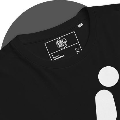 UN4RT black organic cotton t-shirt close-up detail of the inner neck area, showing the UN4RT brand label printed in white inside a rectangular border. care instruction symbols and the upper portion of the squatting person pictogram partially visible below.
