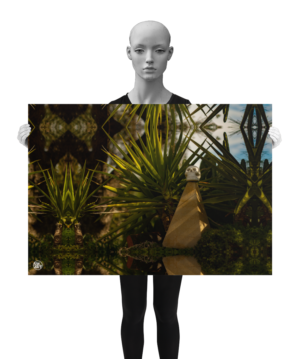 un4rt - a poster. a mirror-framed photographie of a tiny skull on top of a small pyramid. the skul is surrounded by plants. blurry background. the poster is presented by a model in black and white.