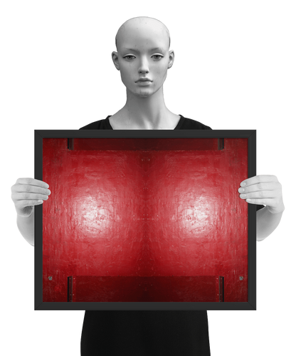 un4rt - the photographie is doubled and then mirrored to create the final image. the image shows a structured red wall with some signs of destruction and a bright reflection of a light in the center. darker parts on the top and the bottom. the image is framed and presented by a mannequin in black and white.