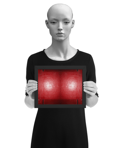 un4rt - the photographie is doubled and then mirrored to create the final image. the image shows a structured red wall with some signs of destruction and a bright reflection of a light in the center. darker parts on the top and the bottom. the image is framed and presented by a mannequin in black and white.