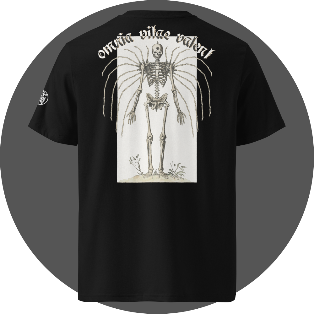 UN4RT black organic cotton t-shirt shown from the back, featuring a large off-white rectangular vintage anatomical illustration of a skeleton with extended rib bones spreading outward like wings and small plants at the feet, arched gothic blackletter text reading "omnia vitae valent" above, small circular brand logo visible on the left sleeve.