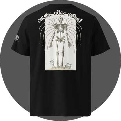 UN4RT black organic cotton t-shirt shown from the back, featuring a large off-white rectangular vintage anatomical illustration of a skeleton with extended rib bones spreading outward like wings and small plants at the feet, arched gothic blackletter text reading "omnia vitae valent" above, small circular brand logo visible on the left sleeve.