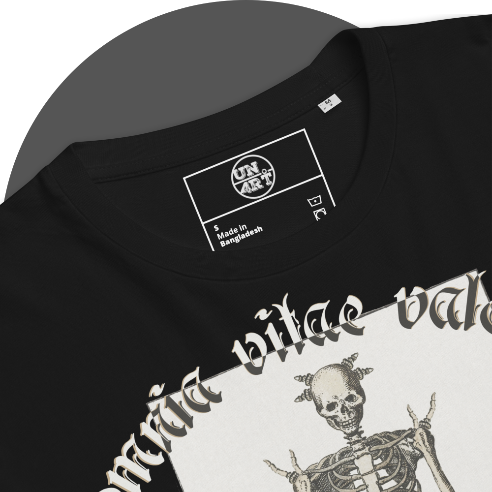UN4RT black organic cotton t-shirt close-up detail of the inner neck area, showing the UN4RT brand label printed in white  inside a rectangular border. care instruction symbols. the gothic blackletter text "omnia vitae valent" and upper skull of the skeleton illustration partially visible below.