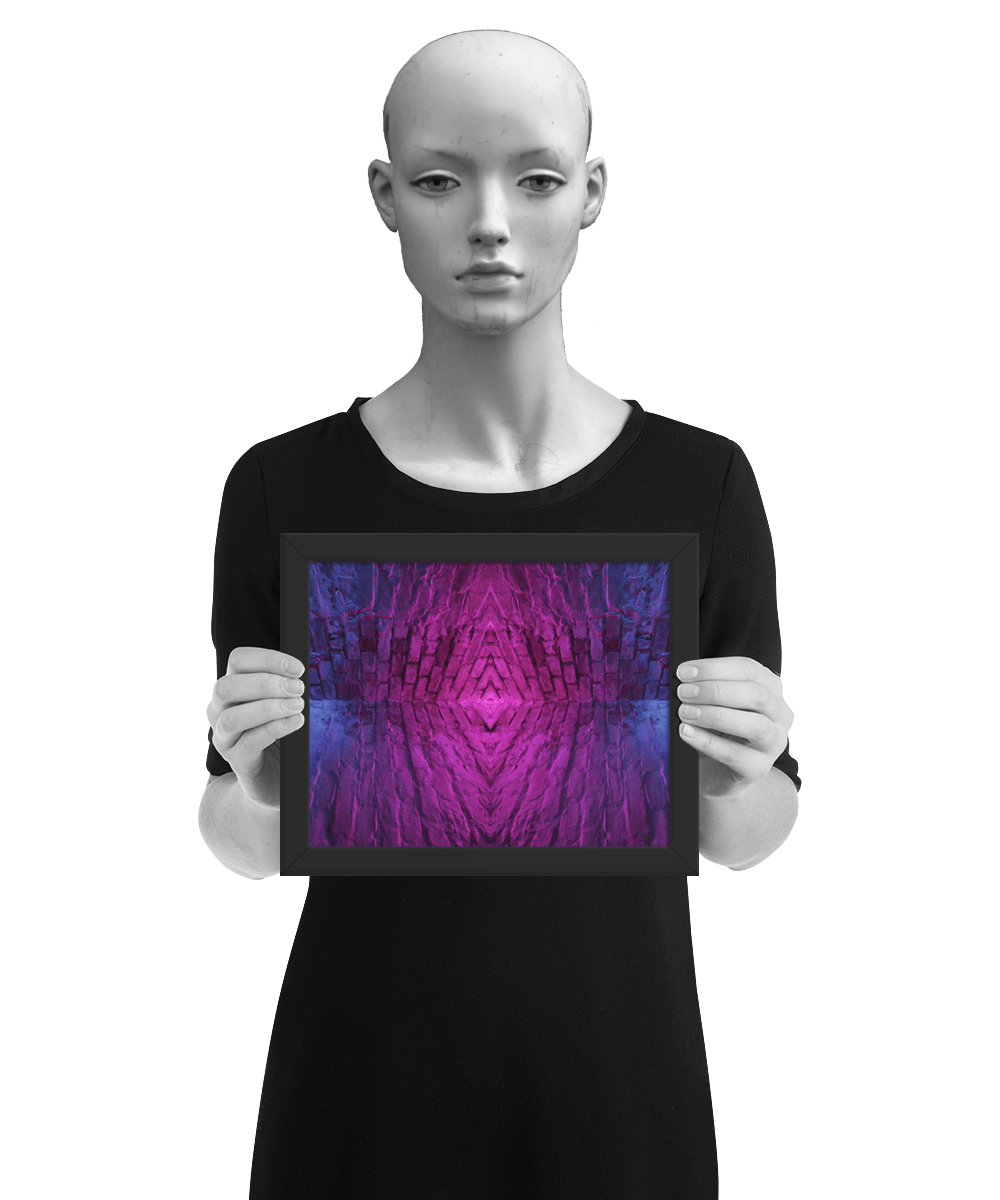 un4rt - the photographie is doubled and then mirrored to create the final image. the image shows the corner of two old brick walls. the colors of the walls range from purple and pink to blue. the image is framed and presented by a mannequin in black and white.
