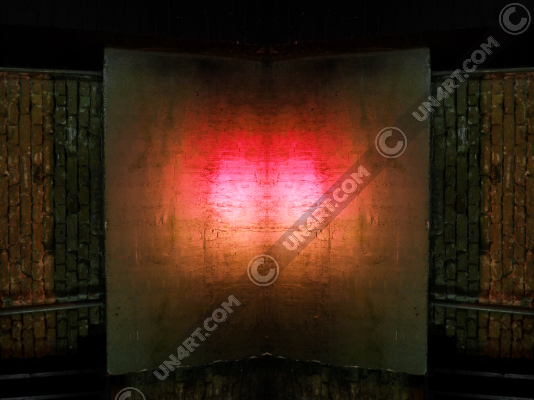 un4rt - the photographie is doubled and then mirrored to create the final image. the photographie shows a brick wall with a porch made of concrete. a steel pipe is coming out of the porch. the colors are mainly golden, but the center of the porch is reflecting light in the colors of orange, red and white.